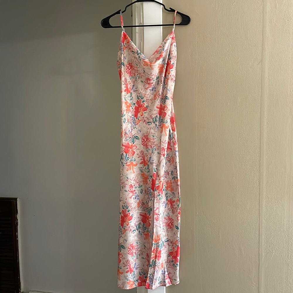 Cowl neck midi dress w/ adjustable straps and slit on left side.